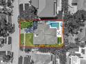 This aerial view showcases the property's layout, pool, patio, and proximity to local amenities at 349 Belleair Ne Dr, St Petersburg, FL 33704
