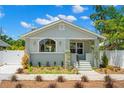 Inviting single-story home with manicured landscaping and attractive curb appeal at 422 24Th N St, St Petersburg, FL 33713