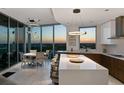 Modern kitchen has state of the art appliances and a large island with counter seating at 777 3Rd N Ave # 1408, St Petersburg, FL 33701