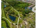 Aerial view of home located within a community and near winding walking trails and ponds at 12026 Medley Ter, Lakewood Ranch, FL 34211