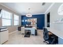 This room features a desk, chair, and bookcase at 13639 Ashlar Slate Pl, Riverview, FL 33579