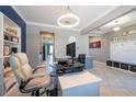 The office includes a chair, desk, and bookshelves at 13639 Ashlar Slate Pl, Riverview, FL 33579