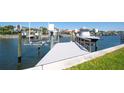 New boat dock with a boat lift, offering direct access to beautiful waterways at 2015 Hawaii Ne Ave, St Petersburg, FL 33703