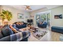 Cozy living room with large windows and stylish decor at 486 Lakeview Dr # 54, Palm Harbor, FL 34683