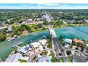 Aerial view of the property, showcasing its location near the water and surrounding neighborhood at 7800 Causeway N Blvd, St Petersburg, FL 33707