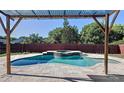 Inviting backyard pool and spa, perfect for relaxation and entertaining guests at 11535 Wellman Dr, Riverview, FL 33578