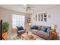 Inviting living room featuring modern decor, cozy seating, and a natural light-filled window at 2314 50Th E Dr, Bradenton, FL 34203