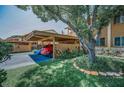Charming townhome with covered parking and mature landscaping, creating a welcoming entrance at 3847 Lighthouse Way # 3847, New Port Richey, FL 34652