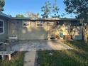 Wide exterior shot of a single-story building with two entrances and lawn at 5829 32Nd N St, St Petersburg, FL 33714