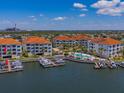Waterfront condos with boat docks and pool in a tropical setting at 1042 Bellasol Way # 202, Apollo Beach, FL 33572