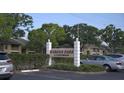 Habana Park condominium community entrance sign with visitor parking and lush green landscaping at 4724 Michael Ct # 122, Tampa, FL 33614