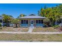 Well-maintained single-Gathering home with mature trees and inviting curb appeal at 2835 Dartmouth N Ave, St Petersburg, FL 33713