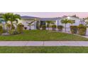 Inviting single-story home with lush landscaping, healthy shrubs, and a well-manicured lawn for an appealing curb view at 4644 Bay Crest Dr, Tampa, FL 33615
