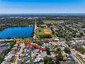 Aerial view of the property with community amenities visible and ocean in background at 12532 115Th St, Largo, FL 33778