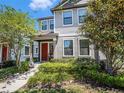Charming home with inviting walkway, lovely front yard, and vibrant landscaping at 5714 Colony Glen Rd, Lithia, FL 33547