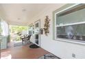 Inviting front porch with comfortable seating and decorative touches at 1008 E 25Th Ave, Tampa, FL 33605