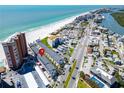 An aerial view shows the location of the condo complex near the beach and waterways at 17960 Gulf Blvd # 111, Redington Shores, FL 33708