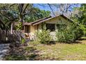 Inviting home showcasing tidy yard, mature trees, and a classic exterior at 29133 Lawton Dr, Nobleton, FL 34661