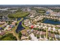 Aerial view of the community highlighting the property's prime location near a pond at 11449 Crestlake Village Dr, Riverview, FL 33569