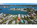 An aerial view of the property location on the water, close to community amenities at 1214 Bay Shore Blvd, Indian Rocks Beach, FL 33785