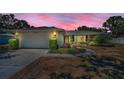 Charming single-story home boasts a well-manicured lawn and an attached two-car garage at 2700 Westchester N Dr, Clearwater, FL 33761