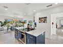 Modern kitchen with stylish island, stainless steel appliances, and bright, open layout at 420 48Th N St, St Petersburg, FL 33713