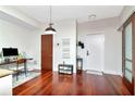 Inviting living room with polished floors, a stylish desk, and a convenient entryway at 912 Channelside Dr # 2710, Tampa, FL 33602