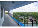 Enjoy beautiful scenic views from this condo balcony overlooking the tennis court and the green surrounding landscape at 2780 N Riverside Dr # 802, Tampa, FL 33602