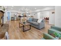 Bright and airy living room showcasing an open layout and seamless flow to the kitchen at 12384 144Th St, Largo, FL 33774