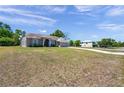 Well-kept single-story home with a spacious front yard at 13290 Don Loop, Spring Hill, FL 34609
