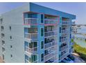 Close-up view of condo balconies, highlighting the building's architecture and outdoor living spaces at 19925 Gulf Blvd # 503, Indian Shores, FL 33785