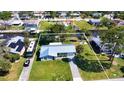 Charming single-story home with lush lawn and mature trees on an oversized lot at 5425 Bluepoint Dr, Port Richey, FL 34668