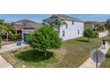 A charming two-story home with lush lawn and mature trees in a desirable neighborhood at 6222 Trent Creek Dr, Sun City Center, FL 33573