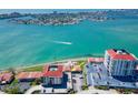 Stunning aerial view of the condo complex situated on the water with beautiful ocean views at 6279 Sun Blvd # 103, St Petersburg, FL 33715