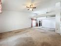 Spacious living room featuring high ceilings and ample natural light at 11216 Longbrooke Dr, Riverview, FL 33579