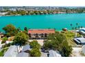 A waterfront condo on lush property has ample parking for residents and visitors at 135 92Nd Ave # 2, Treasure Island, FL 33706