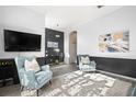 Bright and airy living room with designer decor, comfortable seating, and a sleek TV setup at 20203 Merry Oak Ave, Tampa, FL 33647