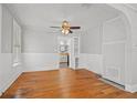 Bright living room with hardwood floors, neutral paint, and a ceiling fan at 2450 3Rd N Ave, St Petersburg, FL 33713