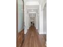 Grand entryway featuring hardwood floors, white molding, and recessed lighting at 2512 S Dundee St, Tampa, FL 33629