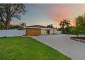 Beautiful single-story home with modern wood accents under an evening sky at 4500 22Nd N Ave, St Petersburg, FL 33713