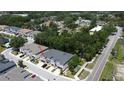 Aerial view of a community featuring townhomes with well maintained landscaping and a parking space at 6617 Citrus Creek Ln, Tampa, FL 33625