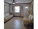Inviting living room featuring tile floors and modern decor at 7503 N Howard Ave, Tampa, FL 33604