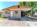 Front exterior showcasing a one-story home with a carport providing covered parking at 907 Tyner St, Plant City, FL 33563