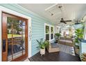 Inviting front porch with seating area perfect for relaxation at 1207 E Giddens Ave, Tampa, FL 33603