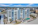 Beachfront condo building featuring a pool and easy access to the sandy shores and ocean views at 17400 Gulf Blvd # I4, North Redington Beach, FL 33708
