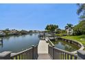 Scenic waterfront view from the private dock and boat lift, perfect for boating enthusiasts at 4226 Saltwater Blvd, Tampa, FL 33615