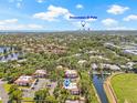 Aerial view showcases the community's serene setting with water views and proximity to Downtown St Pete at 476 Santa Cruz Ne Pl # C, St Petersburg, FL 33703