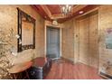 Elegant lobby featuring stylish decor, wood floors, and elevator access at 5823 Bowen Daniel Dr # 606, Tampa, FL 33616