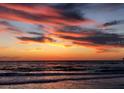 Beautiful ocean sunset with vibrant colors reflecting off the water, perfect for relaxing evenings at 833 Lantana Ave, Clearwater Beach, FL 33767