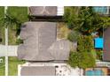 Aerial view showcasing the house and the backyard's potential for outdoor activities at 9327 Pontiac Dr, Tampa, FL 33626